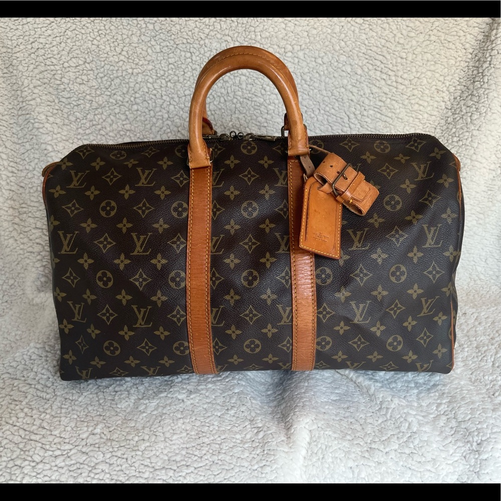 Authentic Louis Vuitton Keepall 45 in Monogram with free Twilly